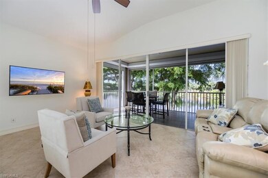 Living room with vaulted ceiling and ceiling fan