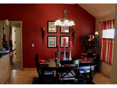 Dining Room. Dining area between kitchen andback d