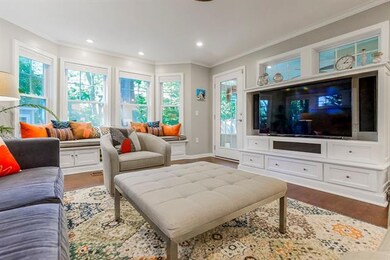Great room with tons of windows for great natural 