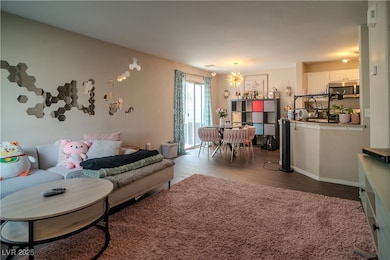 Living area featuring wood finished floors