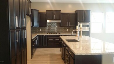 Beautiful dark wood cherry kitchen
