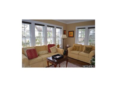 1st floor family room with walls of windows and wo