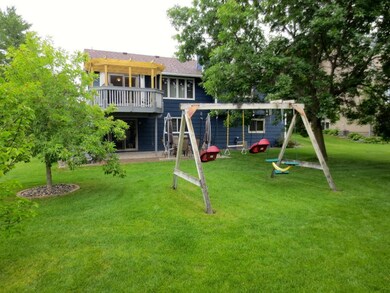 Great backyard with a pergola over the deck that w
