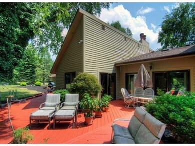 Exterior Back. Expansive deck to entertain or just