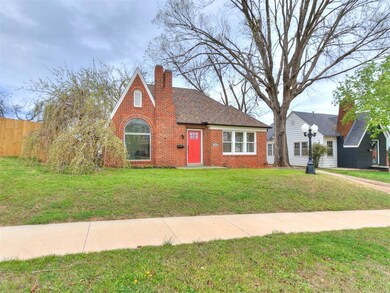 View of front of home featuring a front lawn