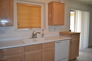 Kitchen with white laminate counters