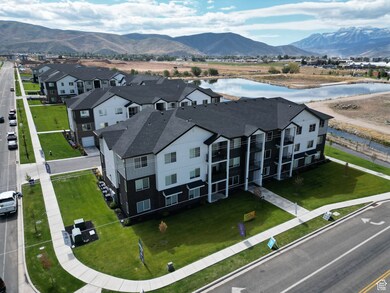 Aerial perspective of suburban area with a water and mountain view