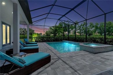 Pool at dusk with salt water pool and hot tub, scr