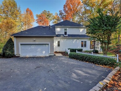 Side entry garage with large parking area