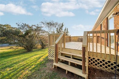 Enjoy the outdoors on the new deck off of kitchen.