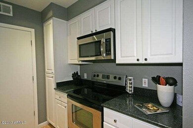 Stainless Steel Appliances & Wood Floors