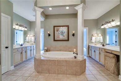 His and her bathroom has a gorgeous chandelier and private sides for your own personal space.  It also has 2 closets so your wife can shop, shop, shop! Did I mention your private Toilet area and linen closet. 