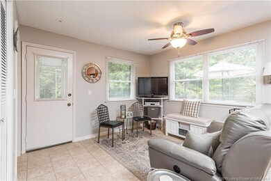 Plenty of windows in the living room let in natura