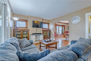 Leaded glass built-ins are a feature throughout the living and dining spaces.