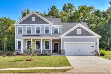 Charming curb appeal with welcoming and beautifull