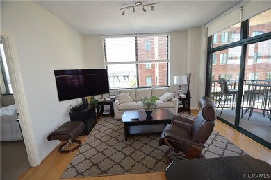 Condo has Great Room with stunning River and city
