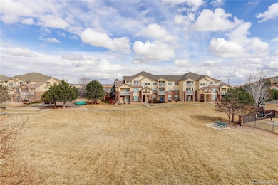 5726 N Genoa Way unit 306, Aurora, CO 80019 - photo 2