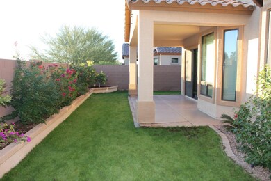 Professionally landscaped lush backyard