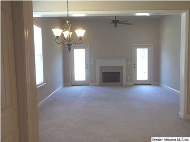 Great room with doors leading to patio