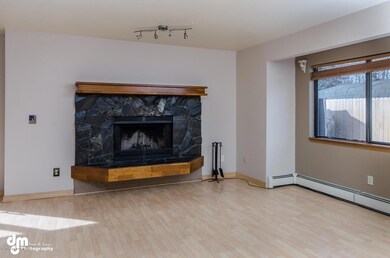 Living Room w/Wood Burning Fireplace