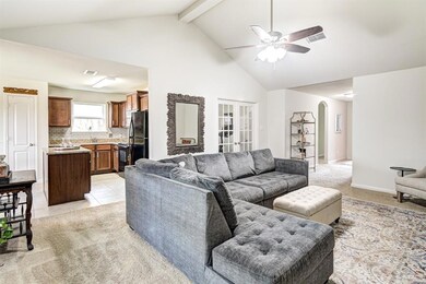 Open concept living room with vaulted ceilings!