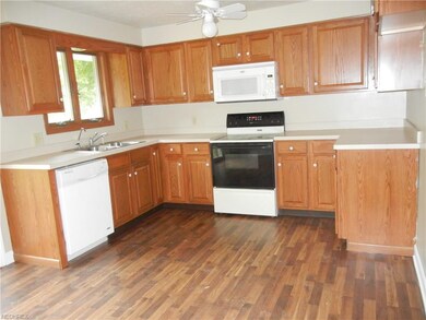 Plenty of cupboards and dishwasher, range, microwa