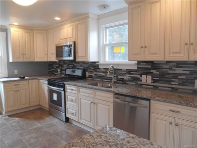 Look at all these beautiful cabinets! Gorgeous bac