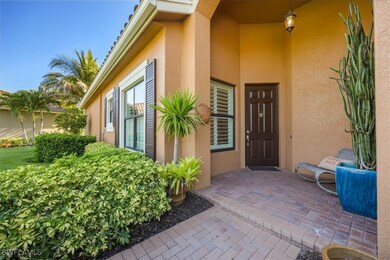 Entrance to property featuring stucco siding