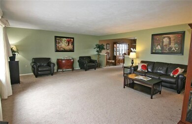 A flexible use floor plan!  The spacious living ro