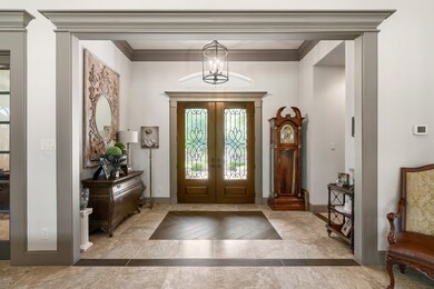 Elegantly appointed with refined crown molding and