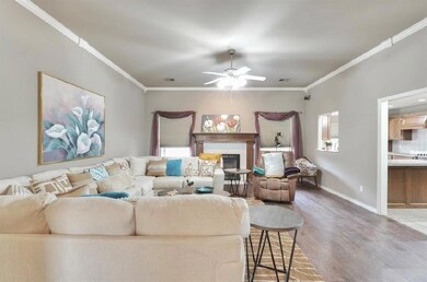 Living room featuring dark hardwood / wood-style f
