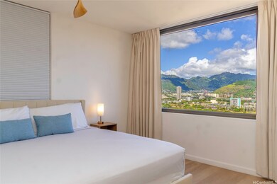 Window to the left above the bed. Stunning mountai