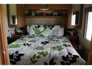 Master with sliding doors, storage.