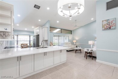 Kitchen featuring high quality fridge, a sink, a c