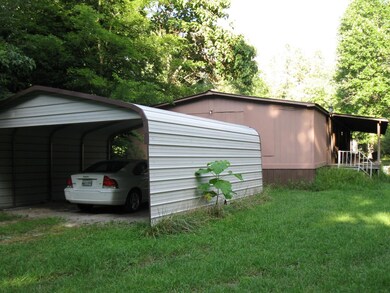  The 2 car carport will be to the side of the home!