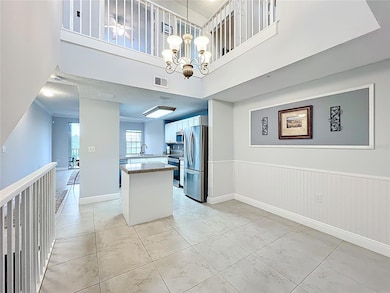 Main living areas are on 2nd floor with the kitchen as the central hub.