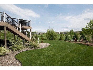 Exceptional landscaping includes front plantings, 