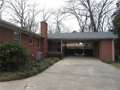 Huge Driveway with 2 Car Carport and Storage on th