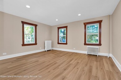 Three Windows in back living room