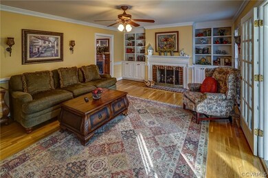Large Family Room with  gas firplace flanked by bu