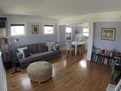 Just painted  spacious living room with gleaming w