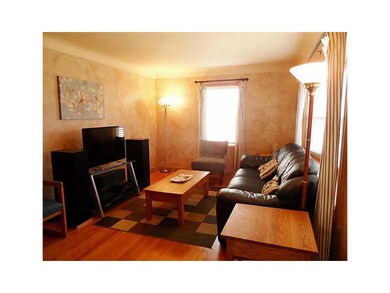 Living Room-L1. First floor living room with firep