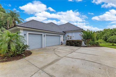 3 Car Garage and Side Entrance - notice extra parking area