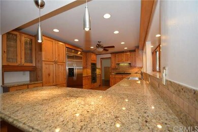 Kitchen with Builtins and Granite Counter Tops