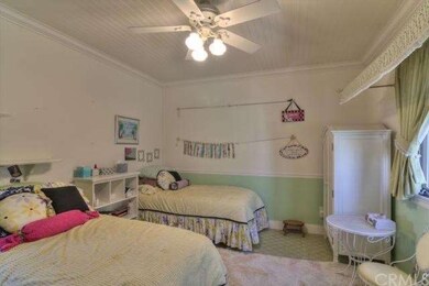 Upstairs bedroom with attached bath.