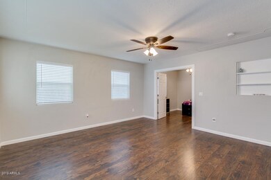 Living Room with View of Den/Bonus Room