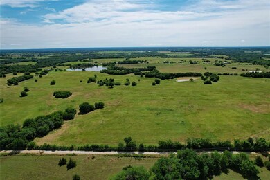 Drone / aerial view with a rural view and a water 