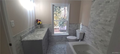 Marble spa bath with jetted tub.