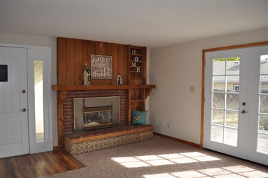 Great gas log fireplace with built in shelving