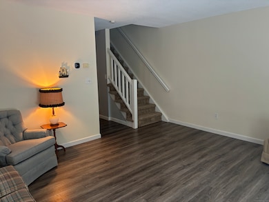 Living Room - stairs leading up to upper level.
